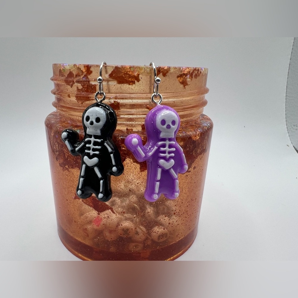 Playful Skeleton Earrings - Black and Purple
